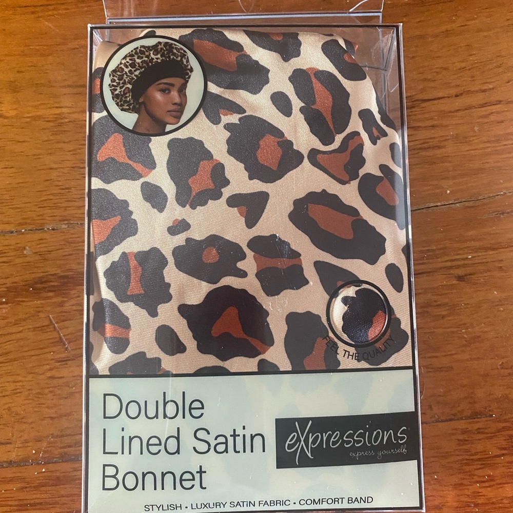 New in box.‎ Expressions  leopard Print double lined Satin Bonnet